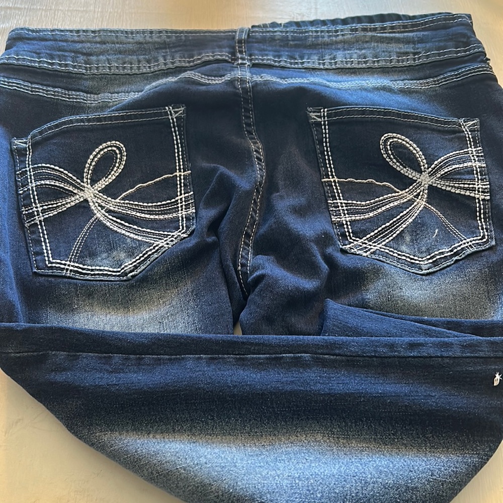 Nwot, slight flare stretch jeans, size XL.